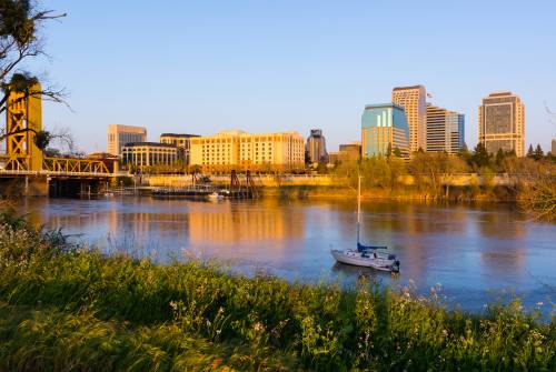 A view of the downtown Sacramento skyline at sunset.